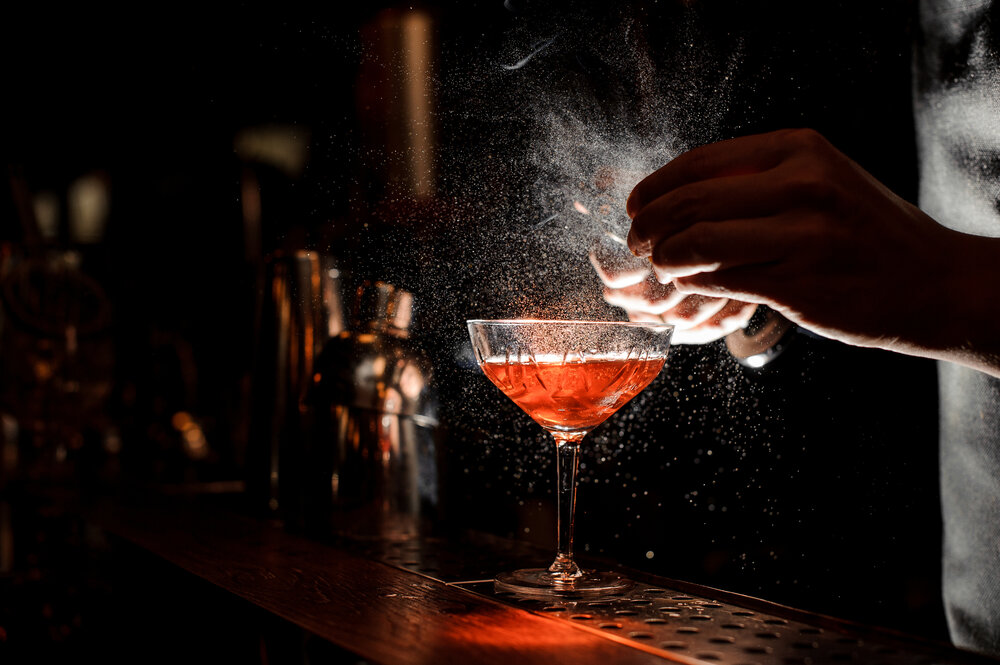 Red cocktail against a black background
